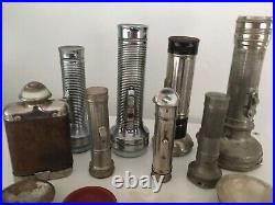 Collection of vintage torches all metal & some old spare torch parts