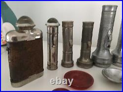 Collection of vintage torches all metal & some old spare torch parts