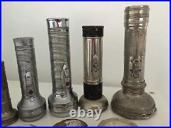 Collection of vintage torches all metal & some old spare torch parts