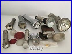 Collection of vintage torches all metal & some old spare torch parts